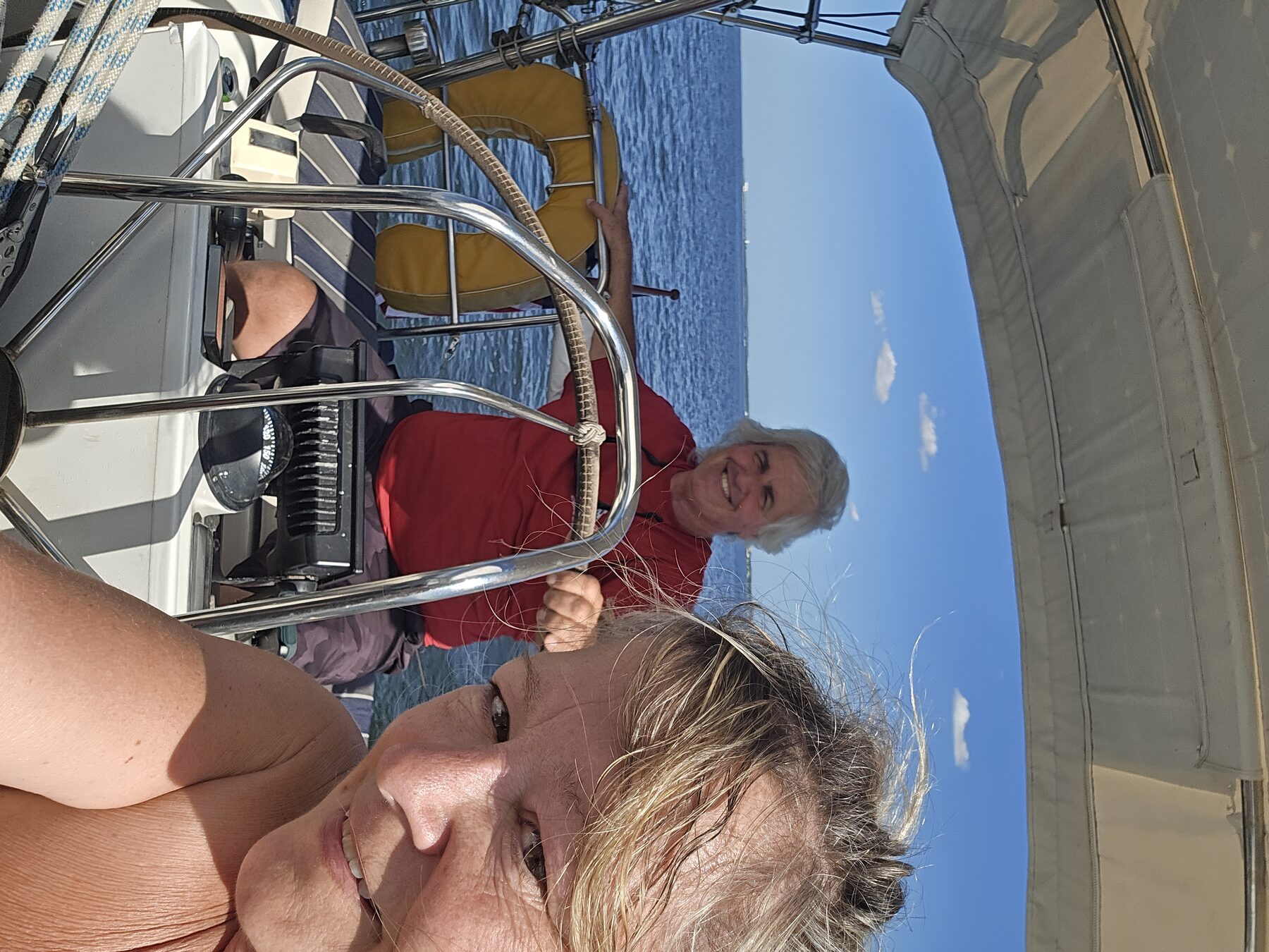 Bourbon and Tequila at the helm on a recent sail